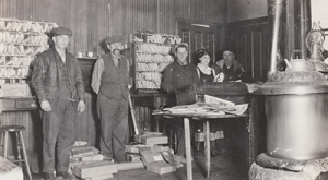 group of people standing at the post office