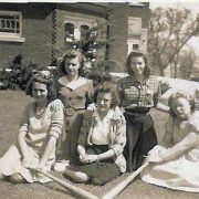 Group of young women in front of Red Brick School.