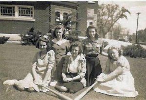 Group of young women in front of Red Brick School.